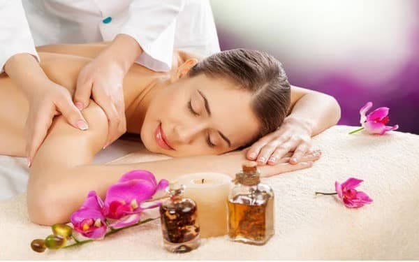 Aromatherapy massage with essential oils.