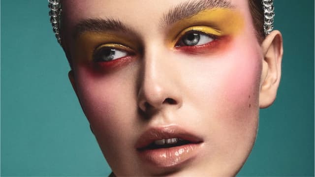 Editorial makeup with high-fashion flair.