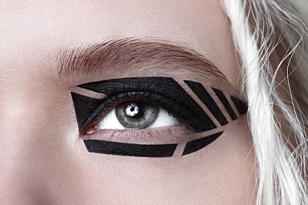 Graphic eyeliner with bold shapes.