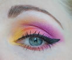 Sunset eye makeup with warm gradient shades.