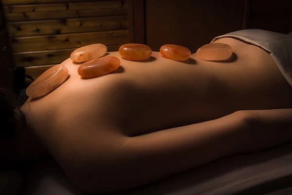 Himalayan Salt Stone Massage for muscle relaxation.