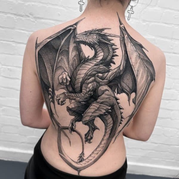 Illustrative tattoos combining realism and traditional illustration styles