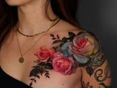 Watercolor tattoos with soft colors blending like paint